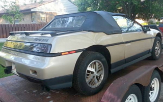 Illustration for article titled This 1986 Pontiac Fiero 2M6 Convertible Asks $2,800, Has Killed